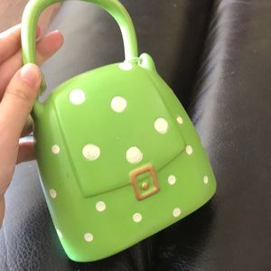 Green and white polka dot piggy bank